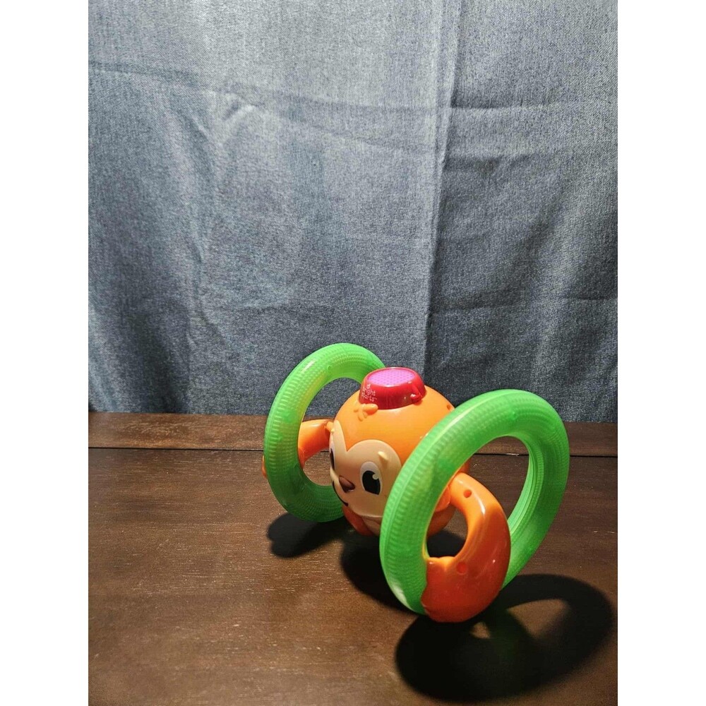 Bright Starts Roll & Glow Monkey | Musical Light Up Crawl Toy | Tummy Time Toy - Picture 3 of 16